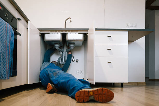 Professional Plumbing technician working in North Oxford, MA
